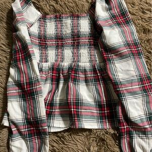 Girls Large. Size 12/14 in children’s. Peplum plaid with long sleeves.